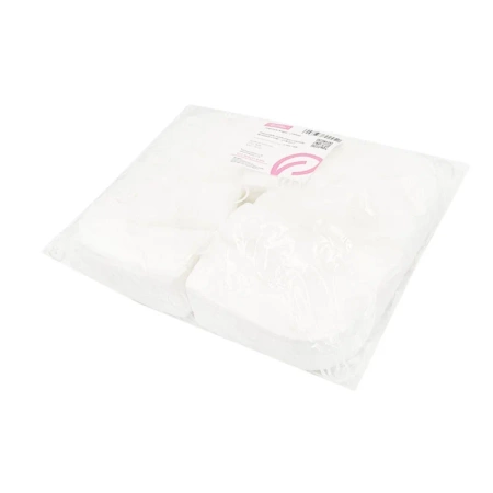 Podkład na zagłówek typu rogal 29cm x 36cm biała włóknina 100szt x 10op